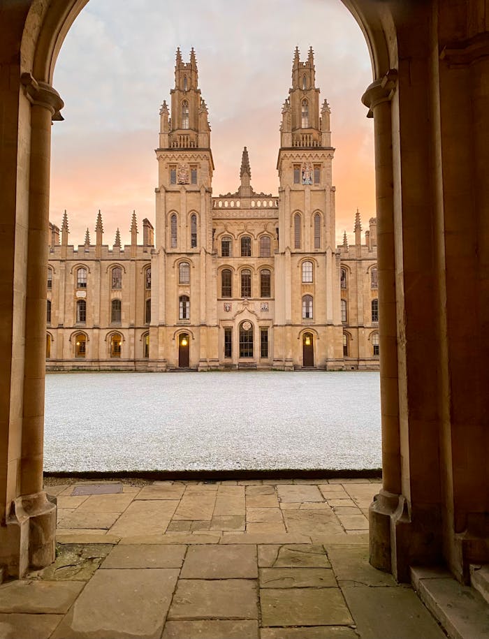Elegant view of the All Souls College facade at Oxford, showcasing Gothic architecture.
